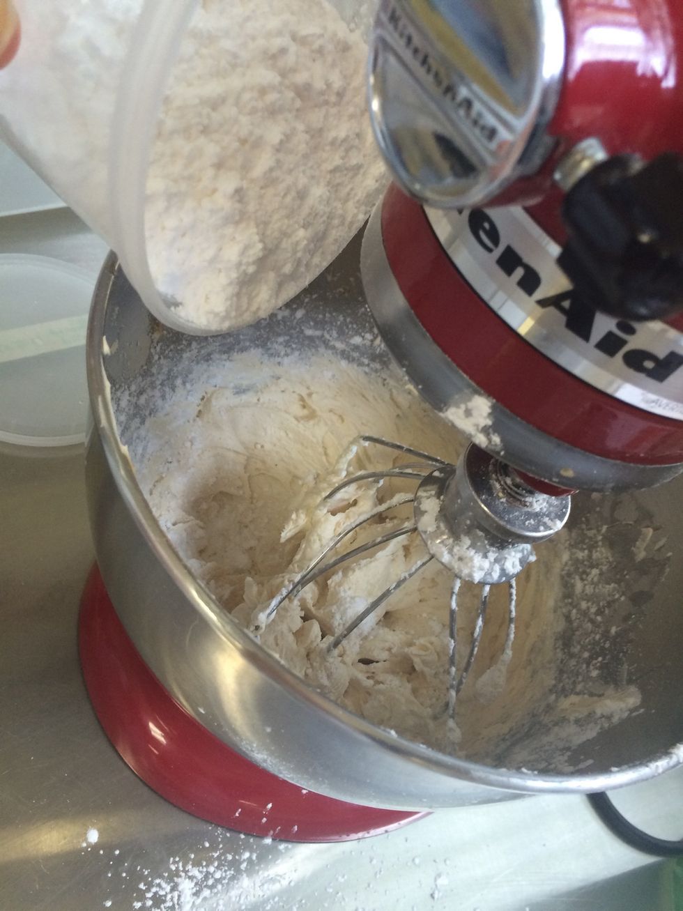Slowly add in the icing sugar (put mixer on low setting).