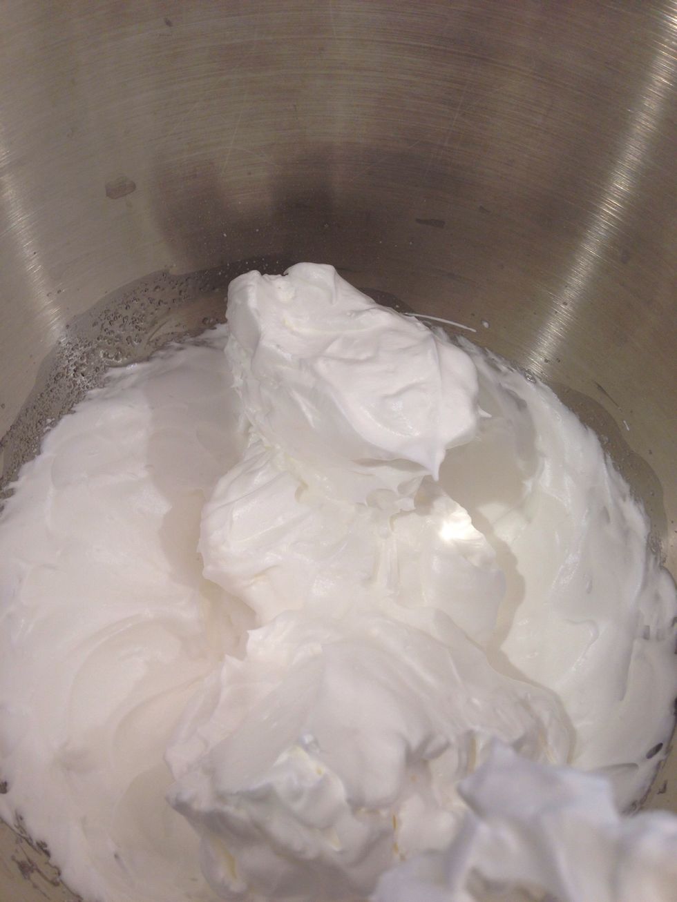 Slowly add sugar little at a time and beat until stiff