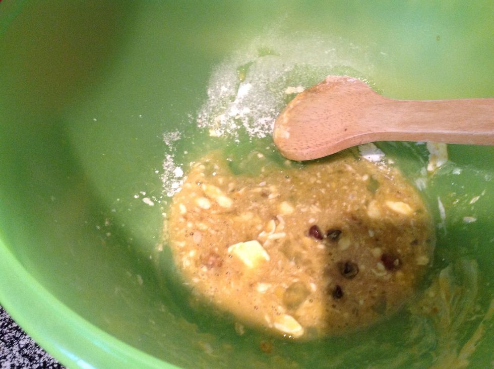 Slowly add the dry ingredients in the medium bowl to the wet ingredients in the large bowl.