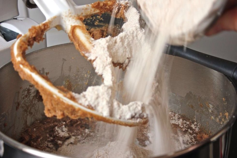 Slowly add the dry mixture into the other one until all the ingredients have come together.