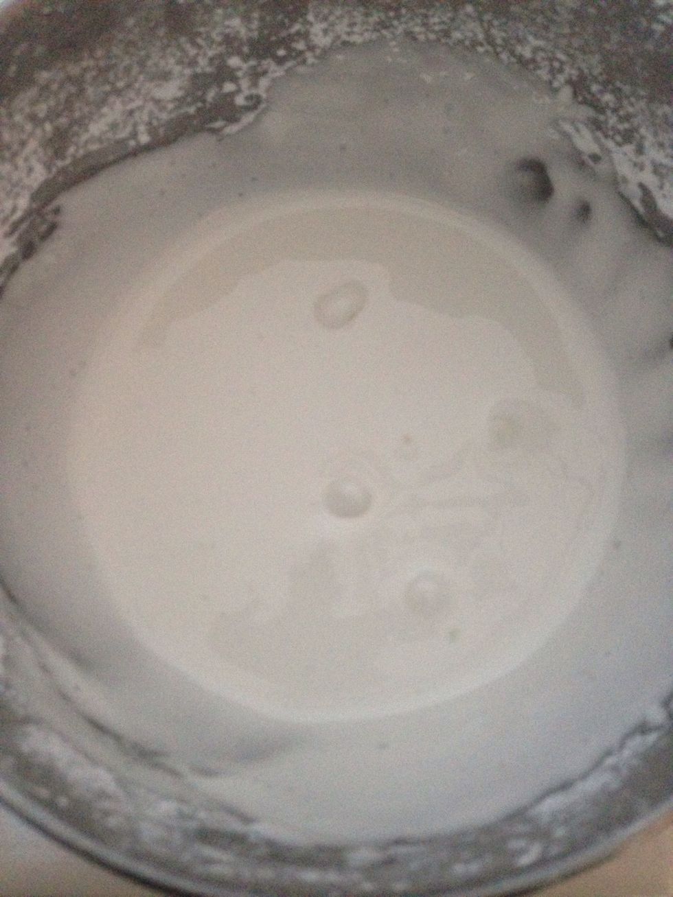 Slowly add the powdered sugar and mix well