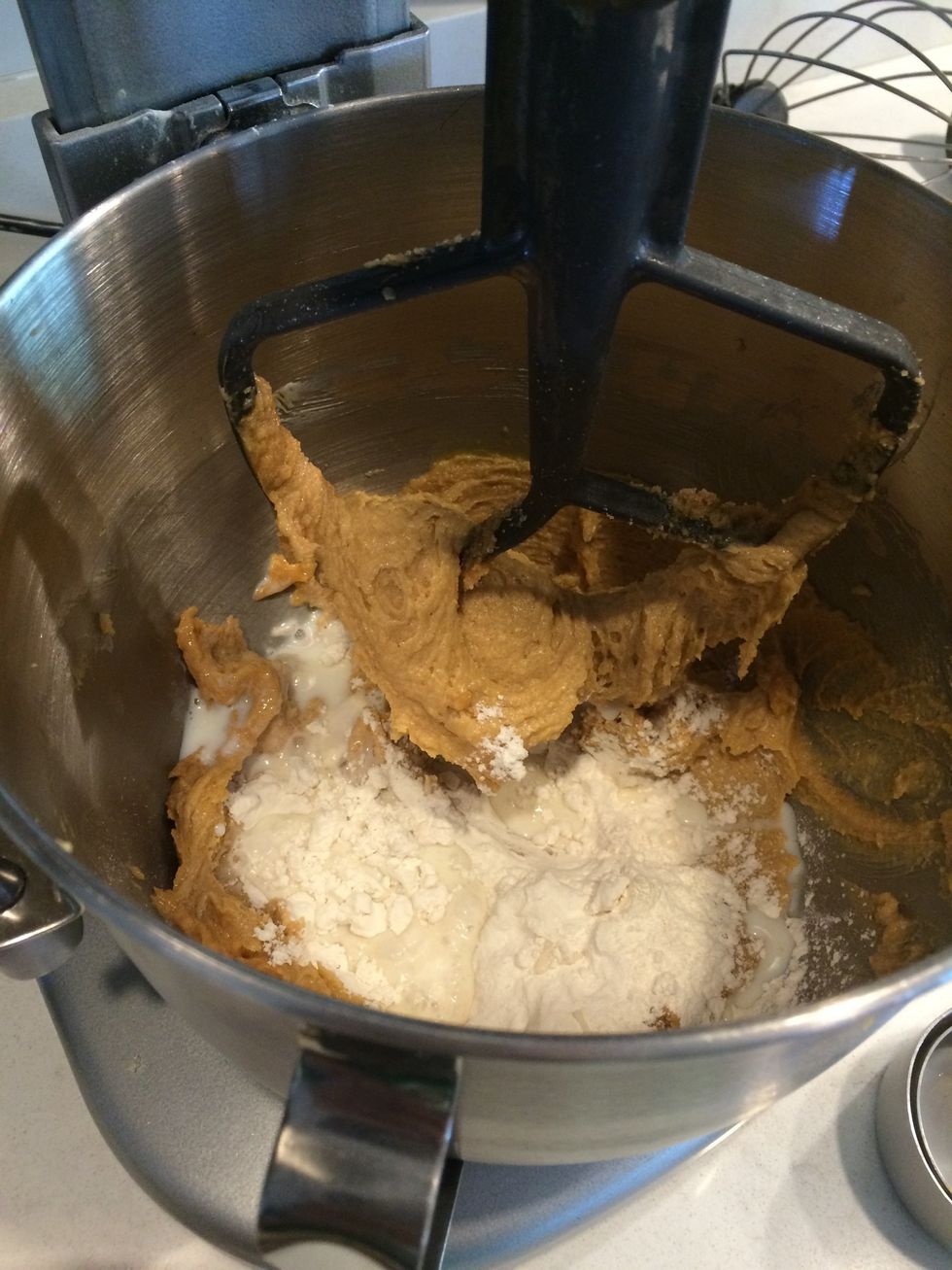 Slowly add them to the wet mixture, alternating with the milk.