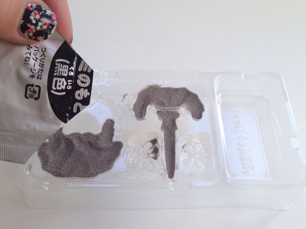 Slowly and carefully dump the powder into the molds of your choice