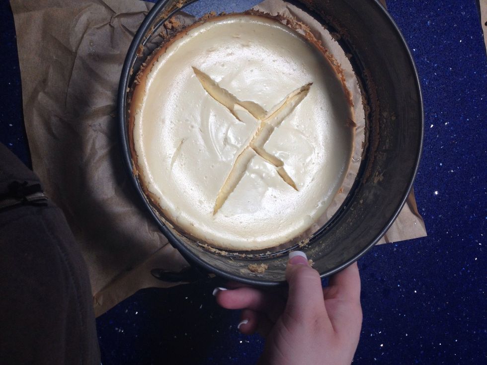 Slowly lifted off, careful to not break any cake with it.