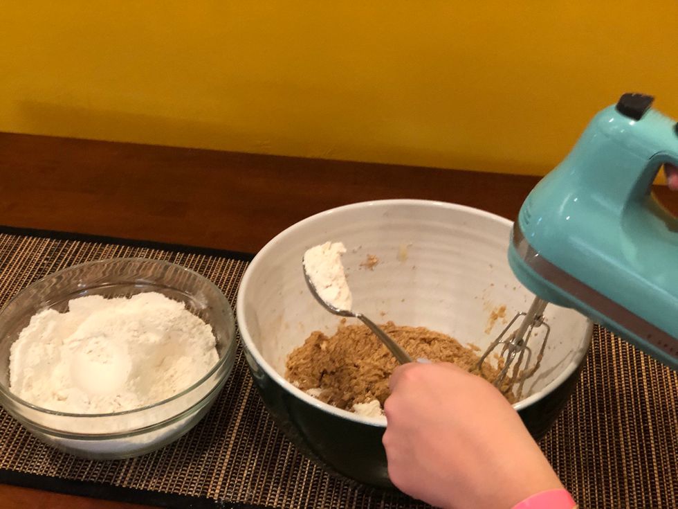 Slowly mix in dry ingredients