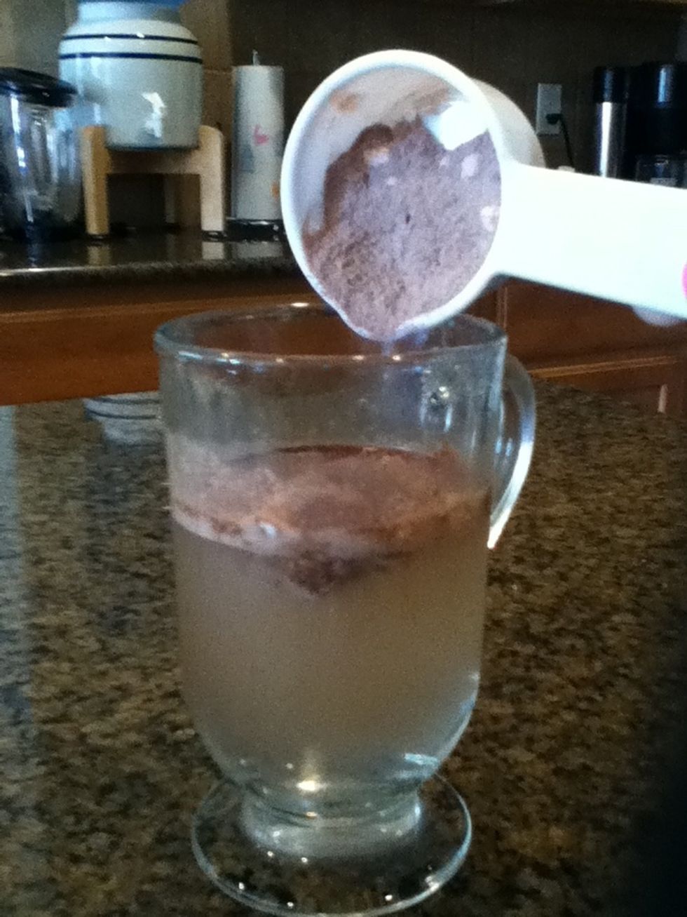 Slowly mix in powder
