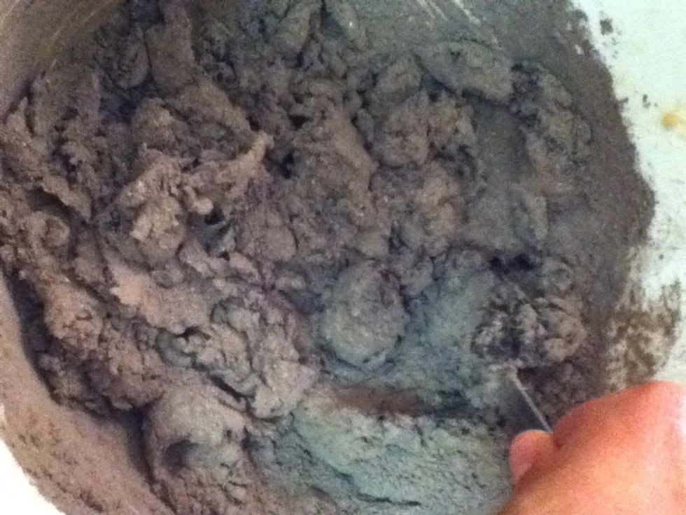 Slowly mix in your dry ingredients to your wet ingredients. The dough will be very thick but keep mixing!