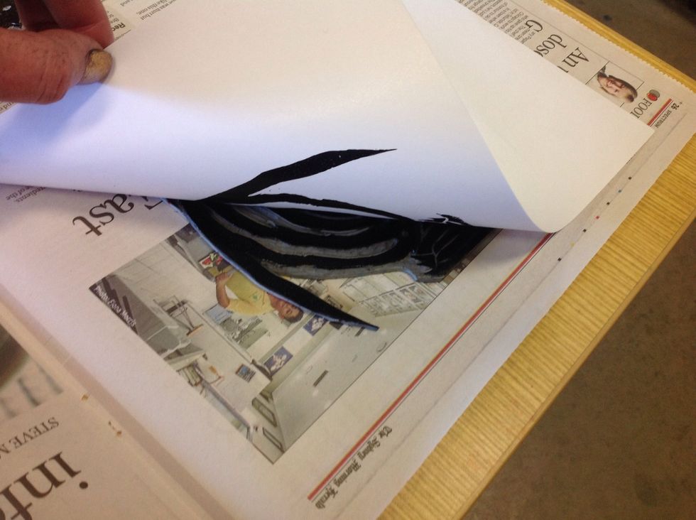 Slowly peel the paper away from the Lino stamp.