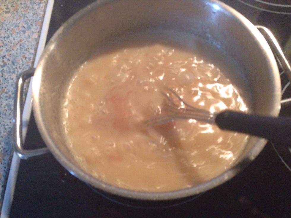 Slowly pour in the cream while constantly stirring. When all is evenly incorporated, take pot off the heat.