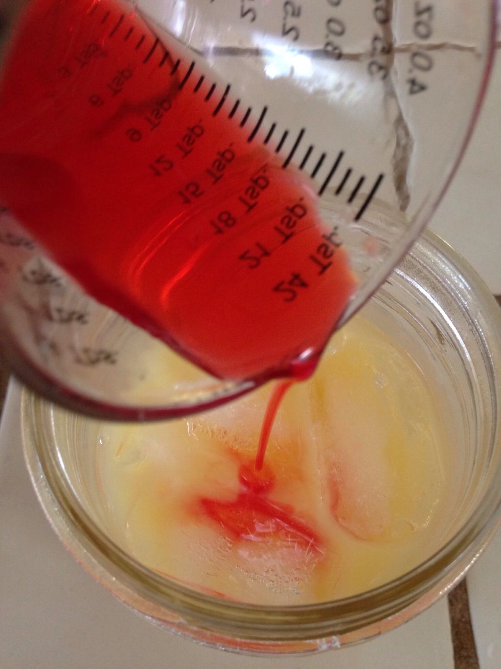 Slowly pour in the grenadine.