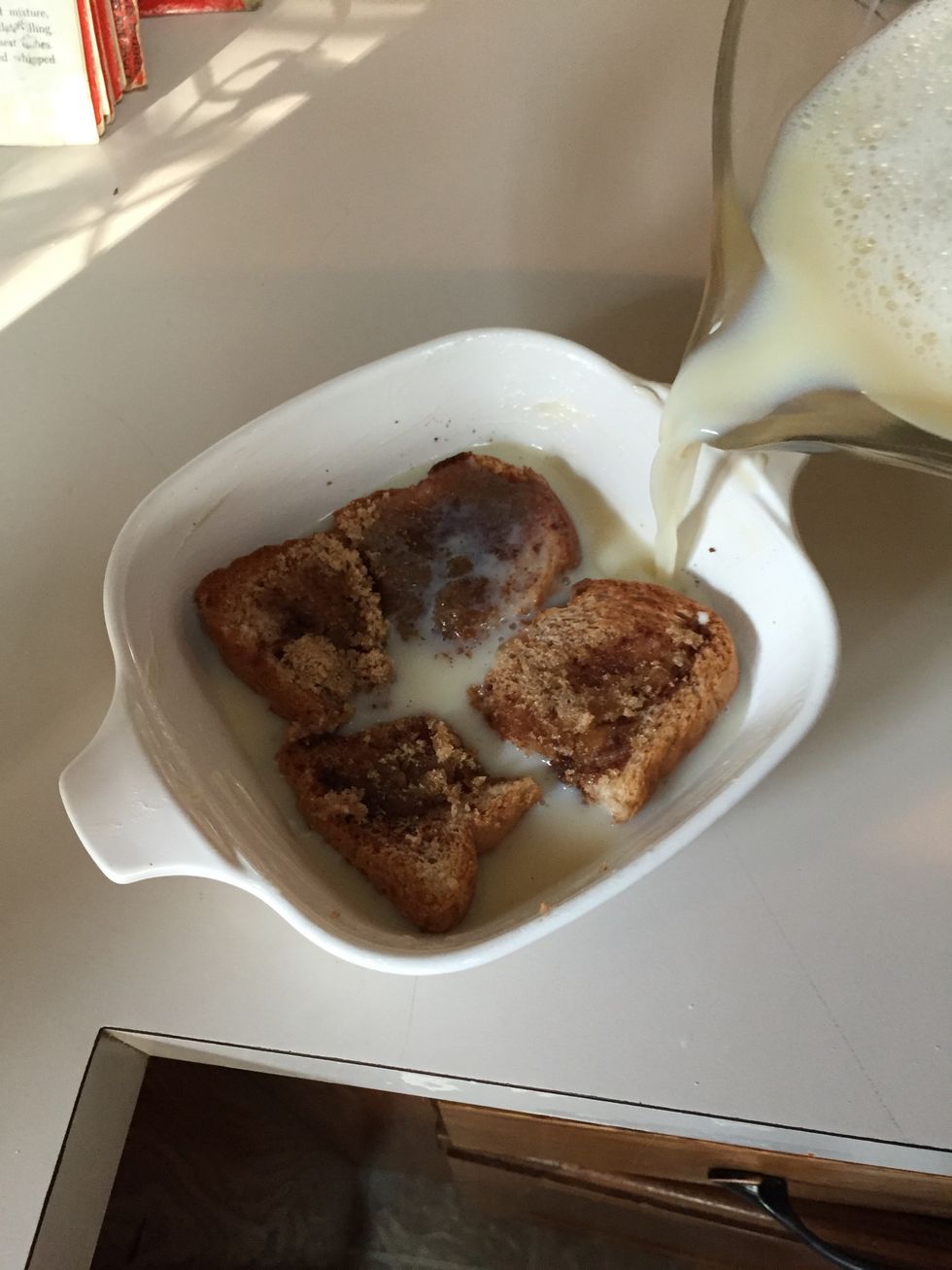 Slowly pour mixture into baking dishes. Your toast squares will both soak up pudding mix AND float to the top.