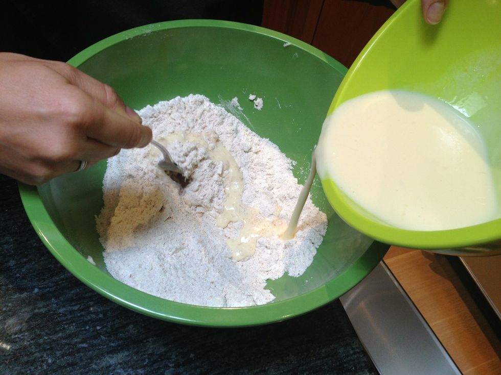 Slowly pour the liquid mixture into the dry mixture. Blend with a fork.