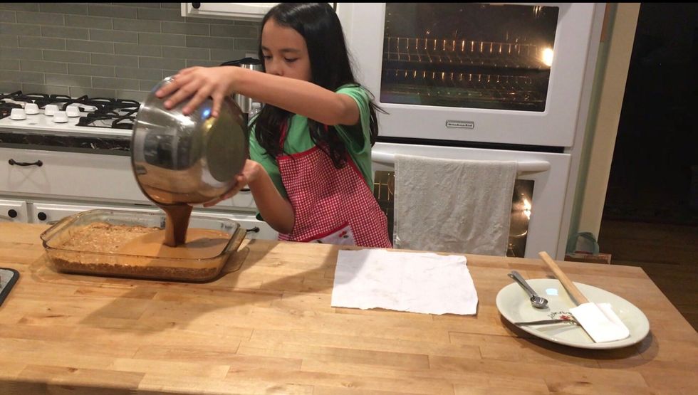 Slowly pour the pumpkin filling in