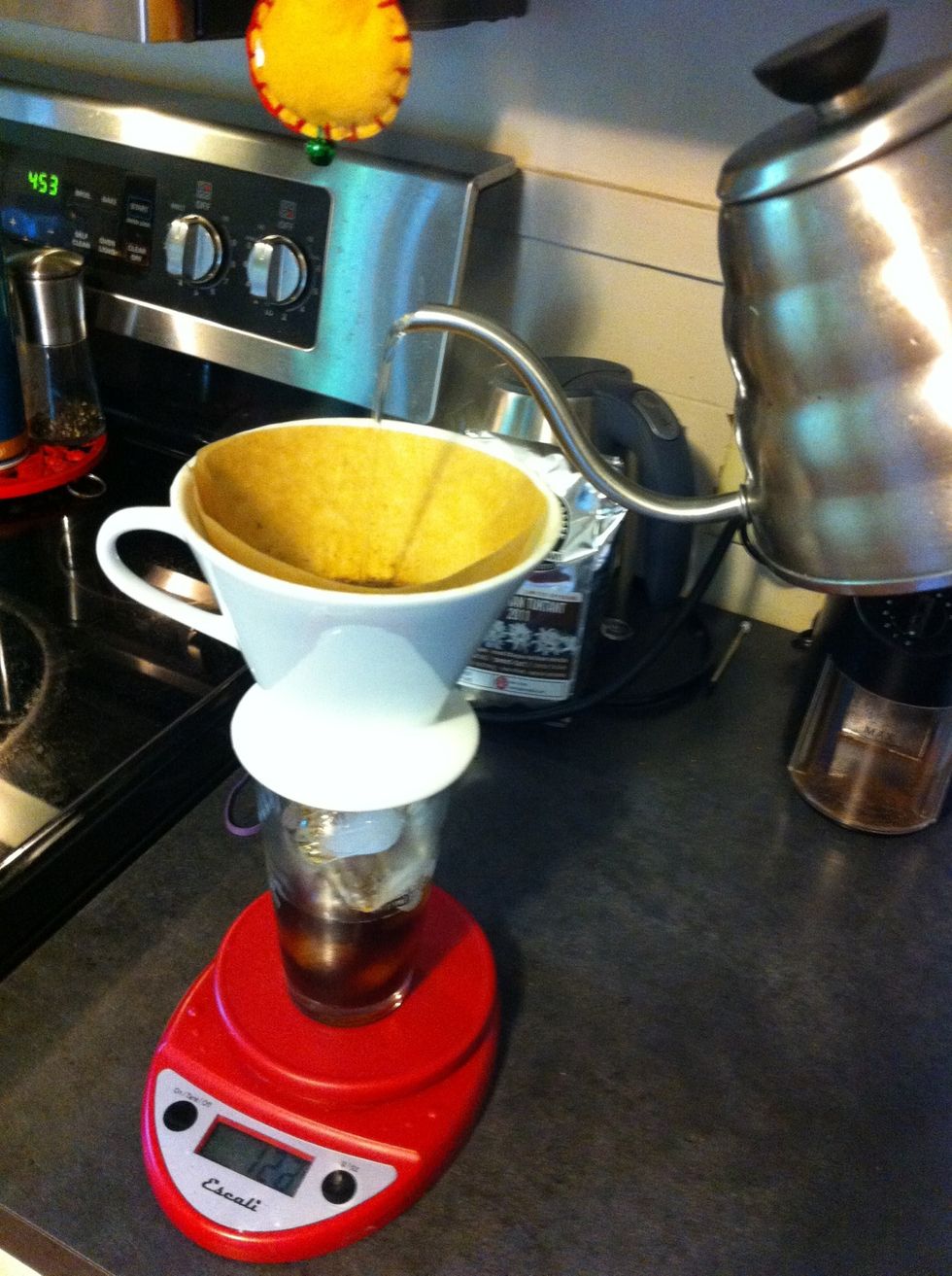 Slowly pour the rest of your water in using small increments, being careful not to add too much at once. Aim for a roughly 2:30-3:00 minute process.