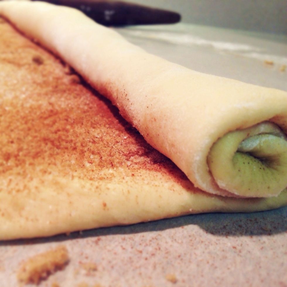 Slowly, roll the dough, making sure to keep the rectangular shape.