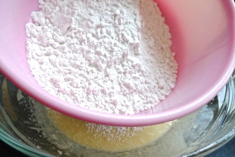 Slowly sift in the all-purpose flour, salt, baking powder and baking soda.