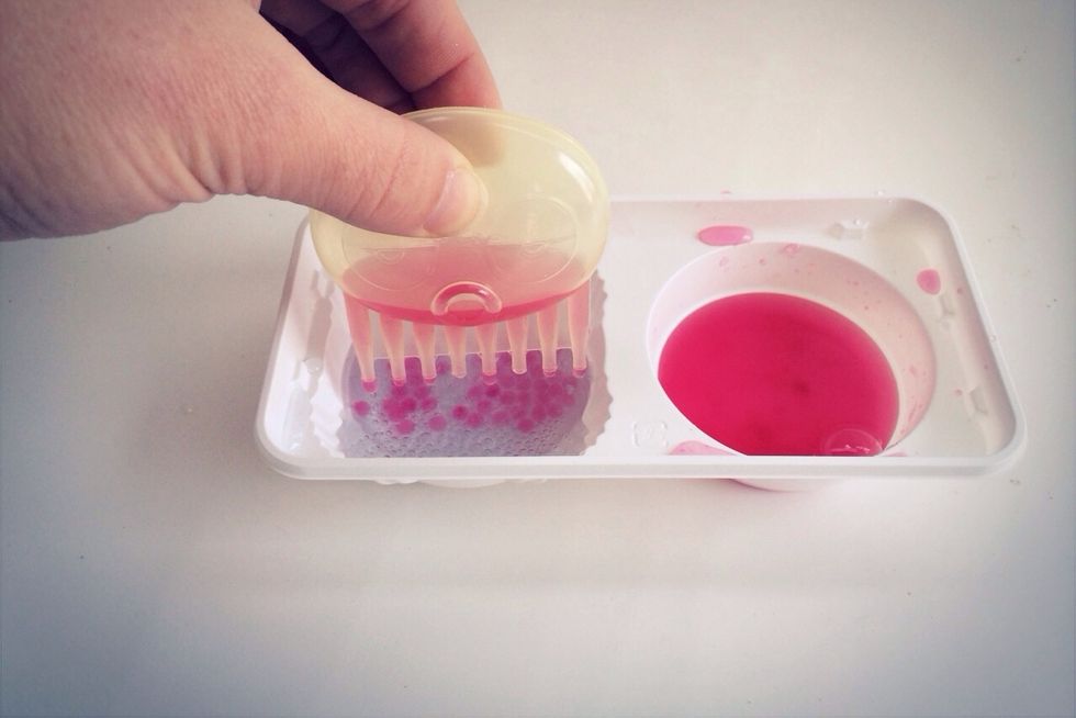 ~Slowly squeeze Octopus to drop the PINK Mix into #1 Left side of tray into BLUE Liquid Mix ~This BLUE Activator will transform PINK liquid into little Jelly Orbs --See Part 2 for Remaining Steps