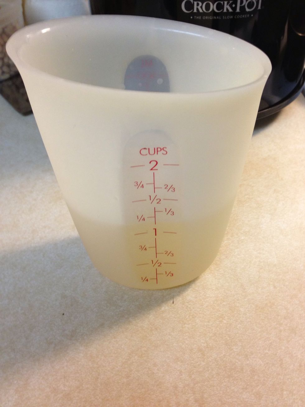 Slowly stir in a little more than a cup of chicken broth.