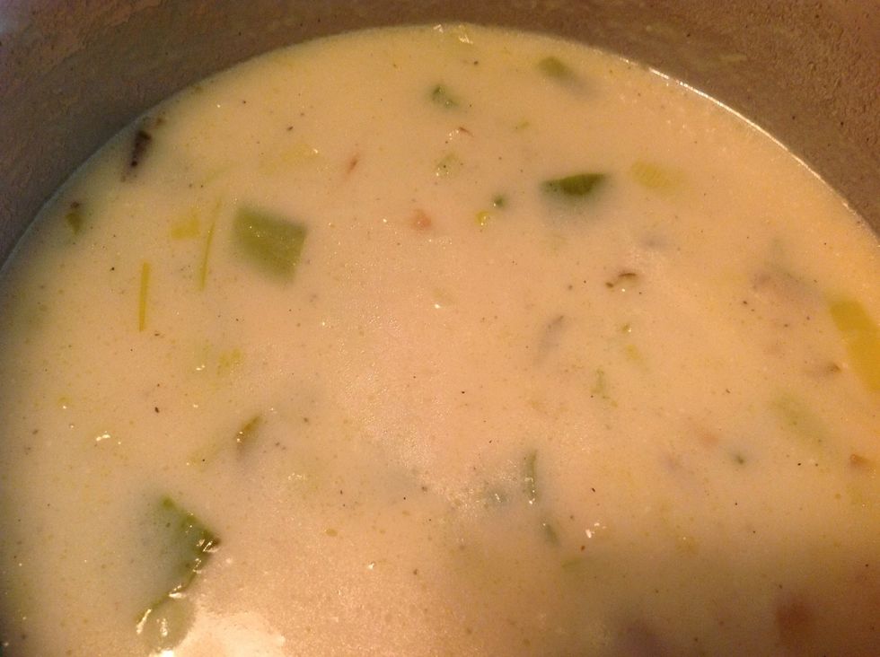 Slowly stir in the instant mashed potatoes until you reach the consistency you want. Add less than you think, as it gets thick. Salt and pepper to taste now, just in case the potatoes are a bit salty.