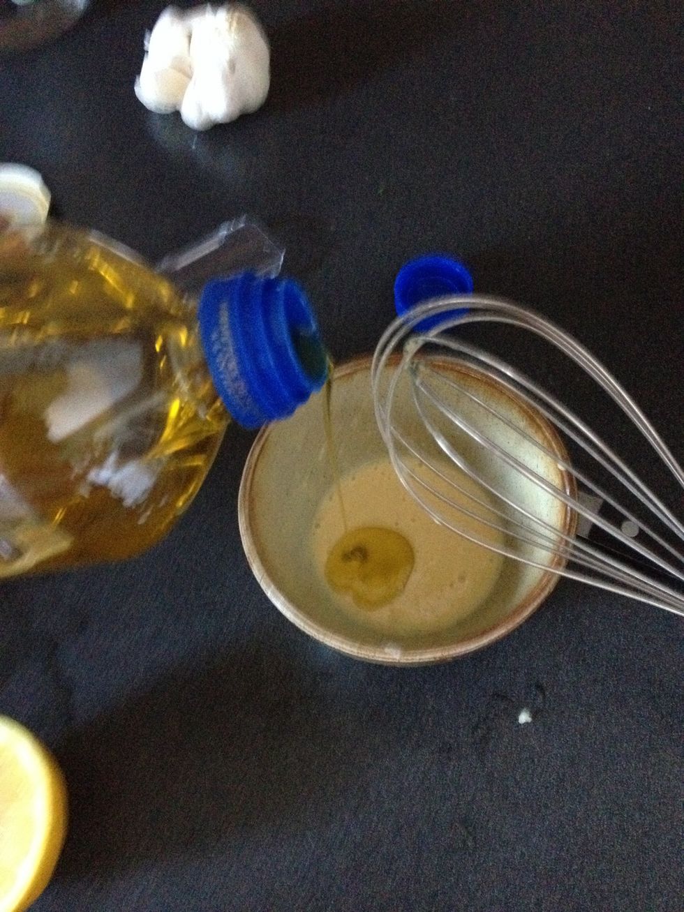 Slowly whisk in olive oil. I use a little less than 1/4 cup. Then add salt and pepper to taste.