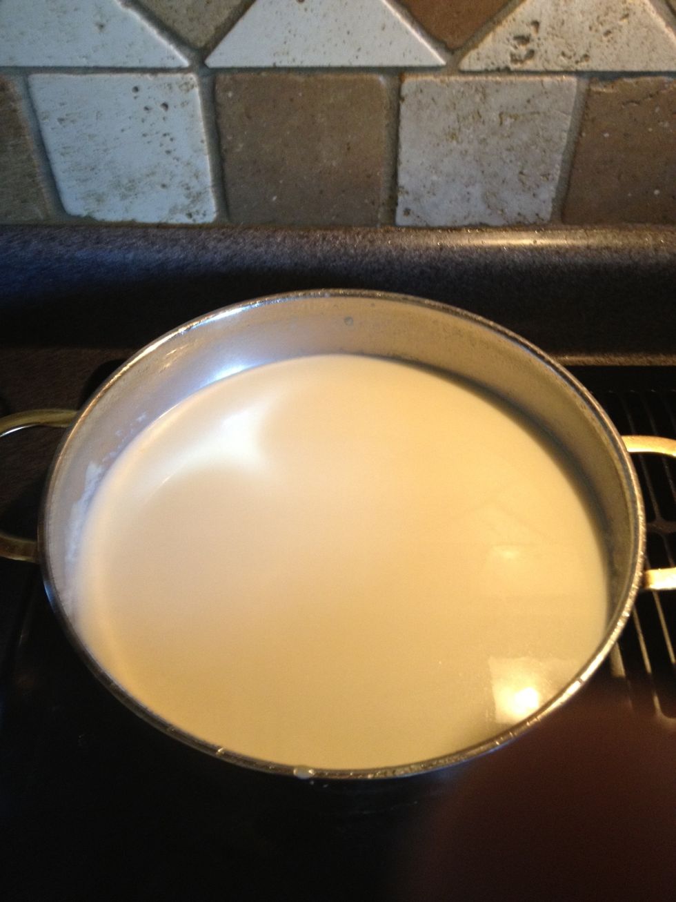 Slowly whisk in your milk making sure its not lumpy as you add the milk