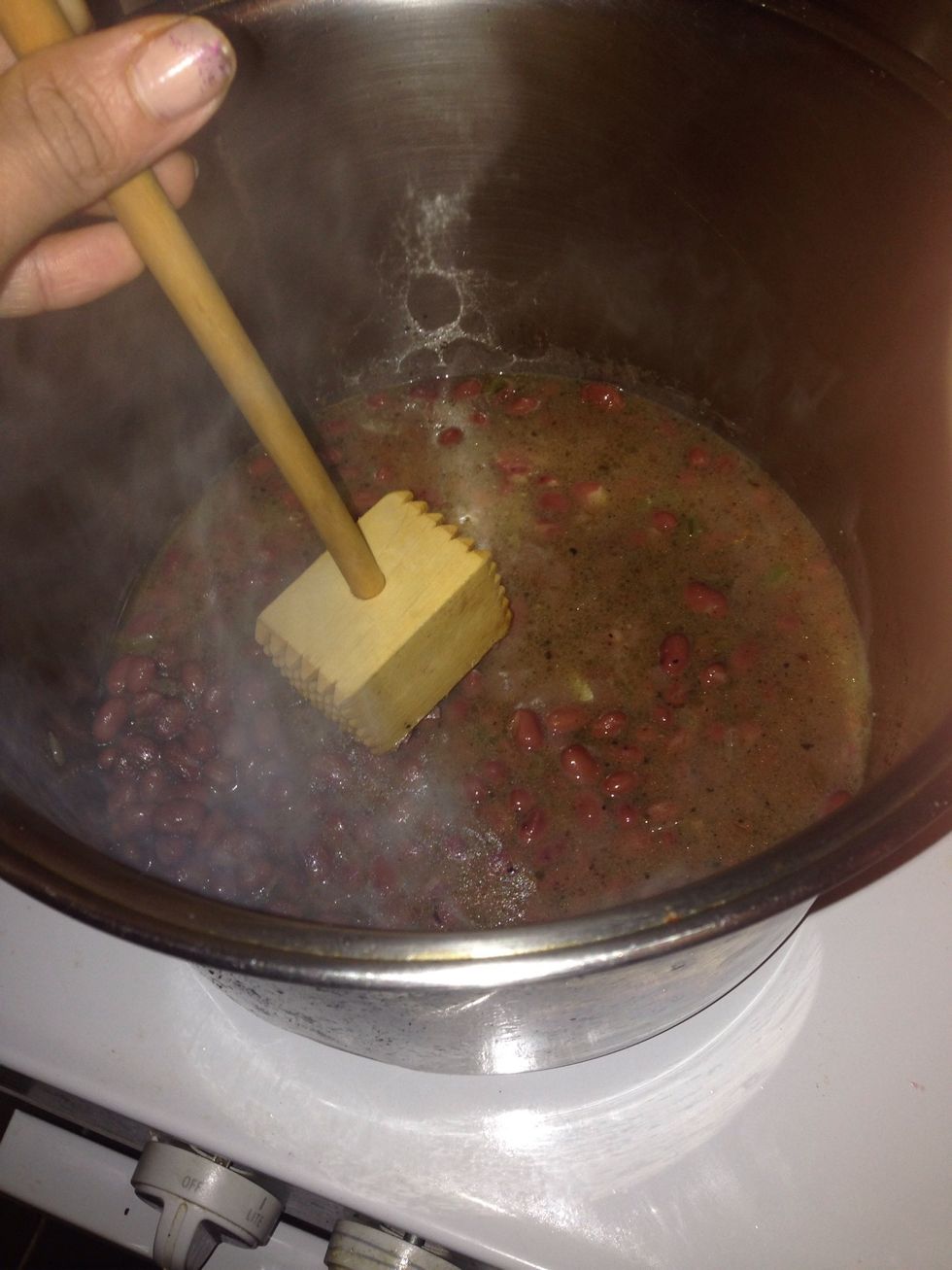 Smash beans a little bit so that their flavor comes out