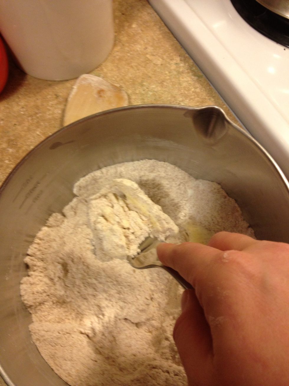 Smash butter into dry stuff