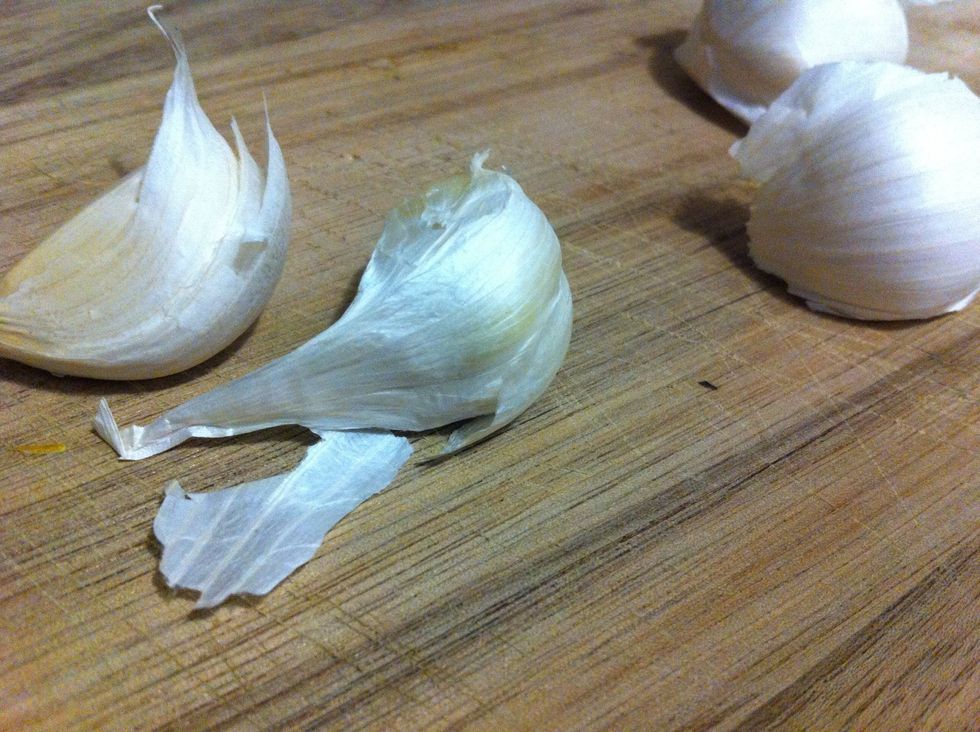 Smash garlic; remove peel