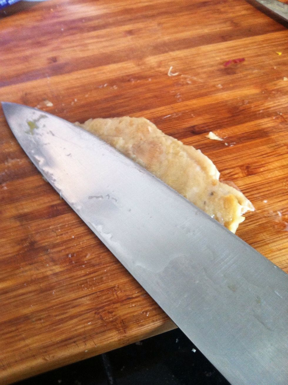 Smash it with side of a knife