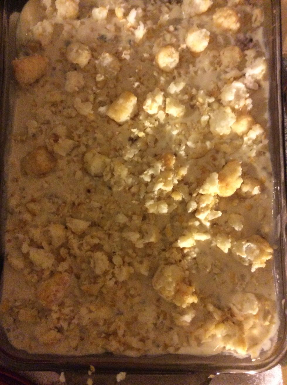 Smash tater tots over the ingredients,spread them around