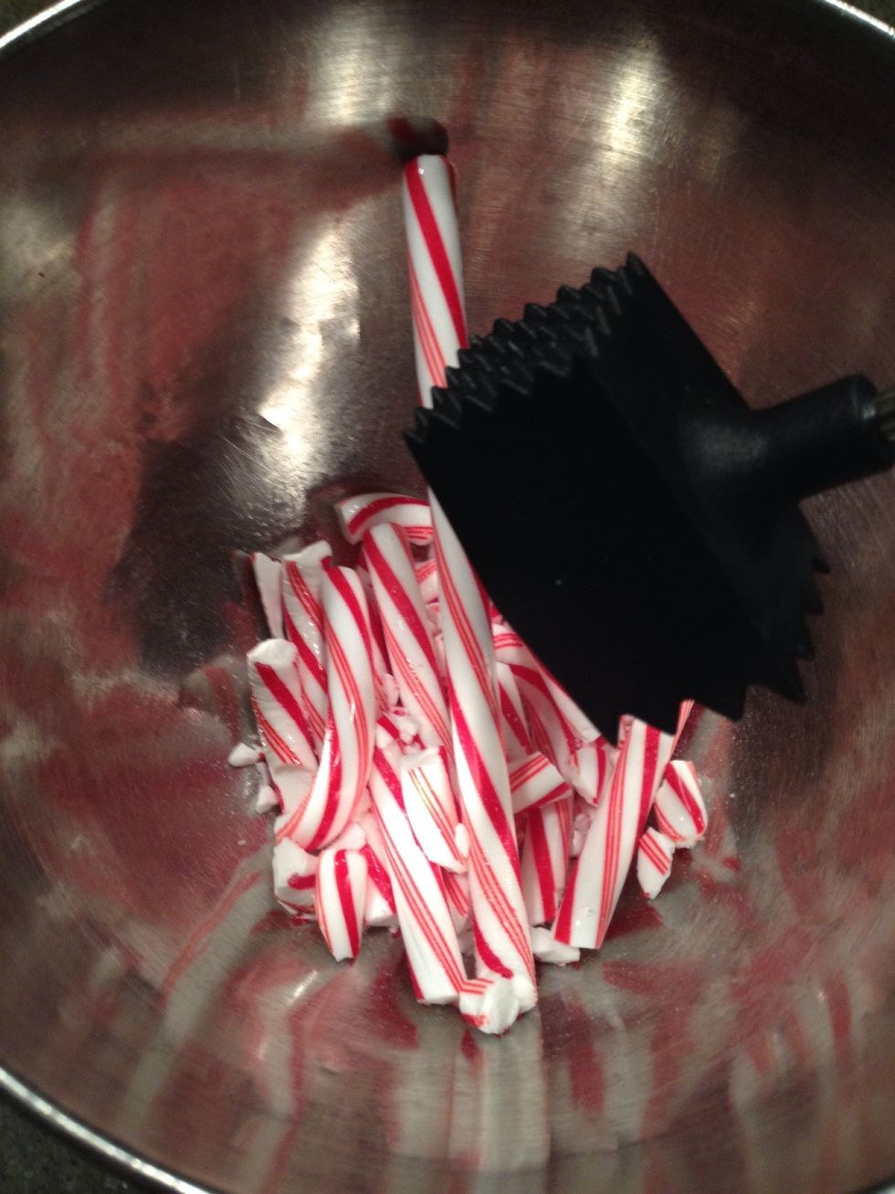 Smash the 5 candy canes that you used and sprinkle them on top of the cupcakes once you're done Icing.