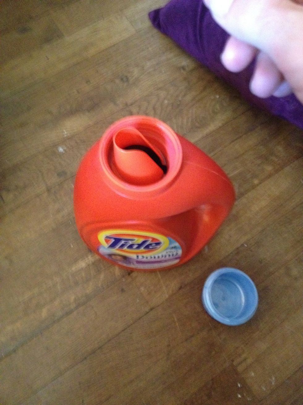 Smear a dab of detergent to stain until slightly frothy