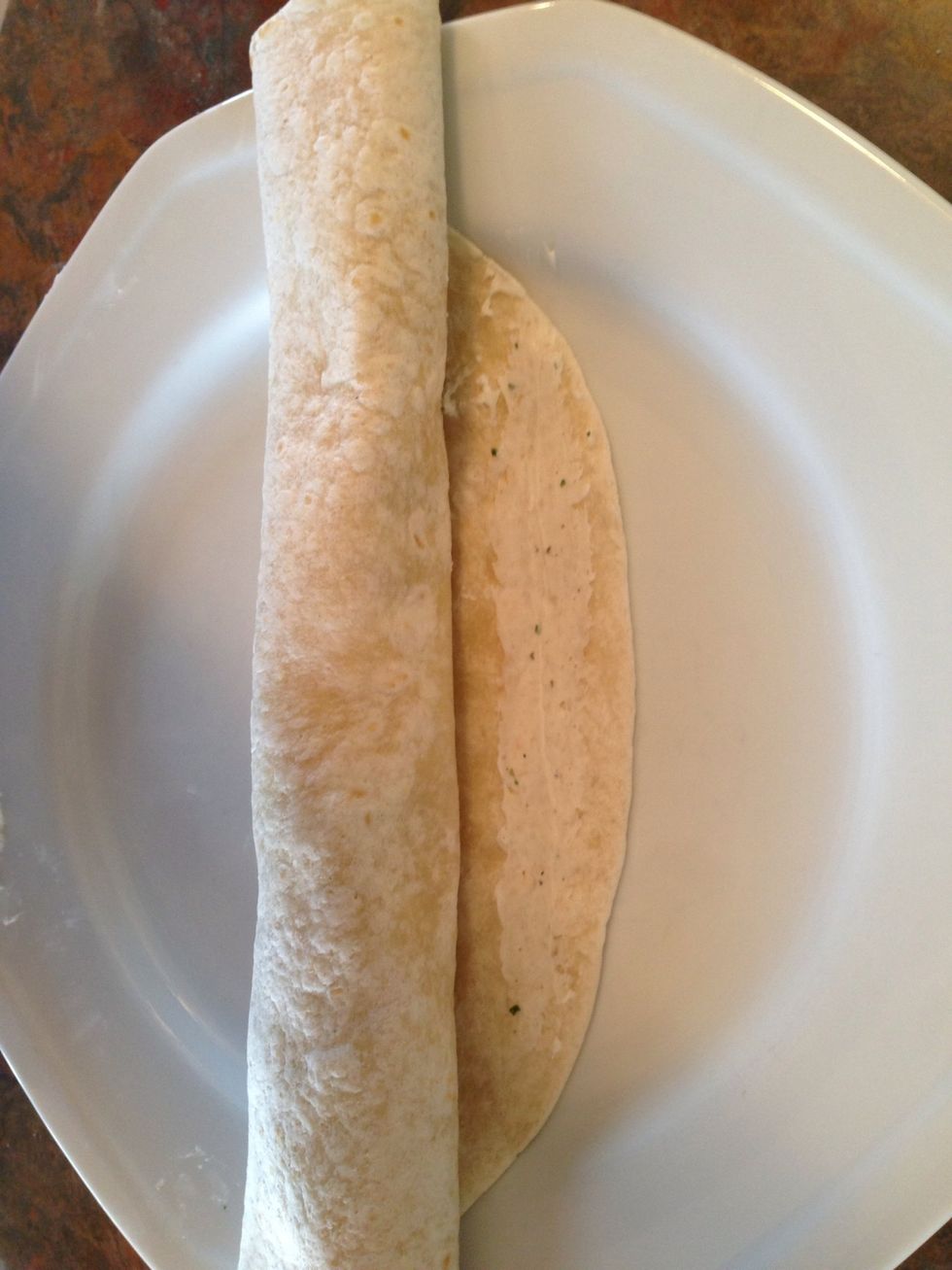 Smear a small strip of cream cheese/ranch mix along the blank edge of the tortilla before fully rolling up. This will help the pinwheels stick together.