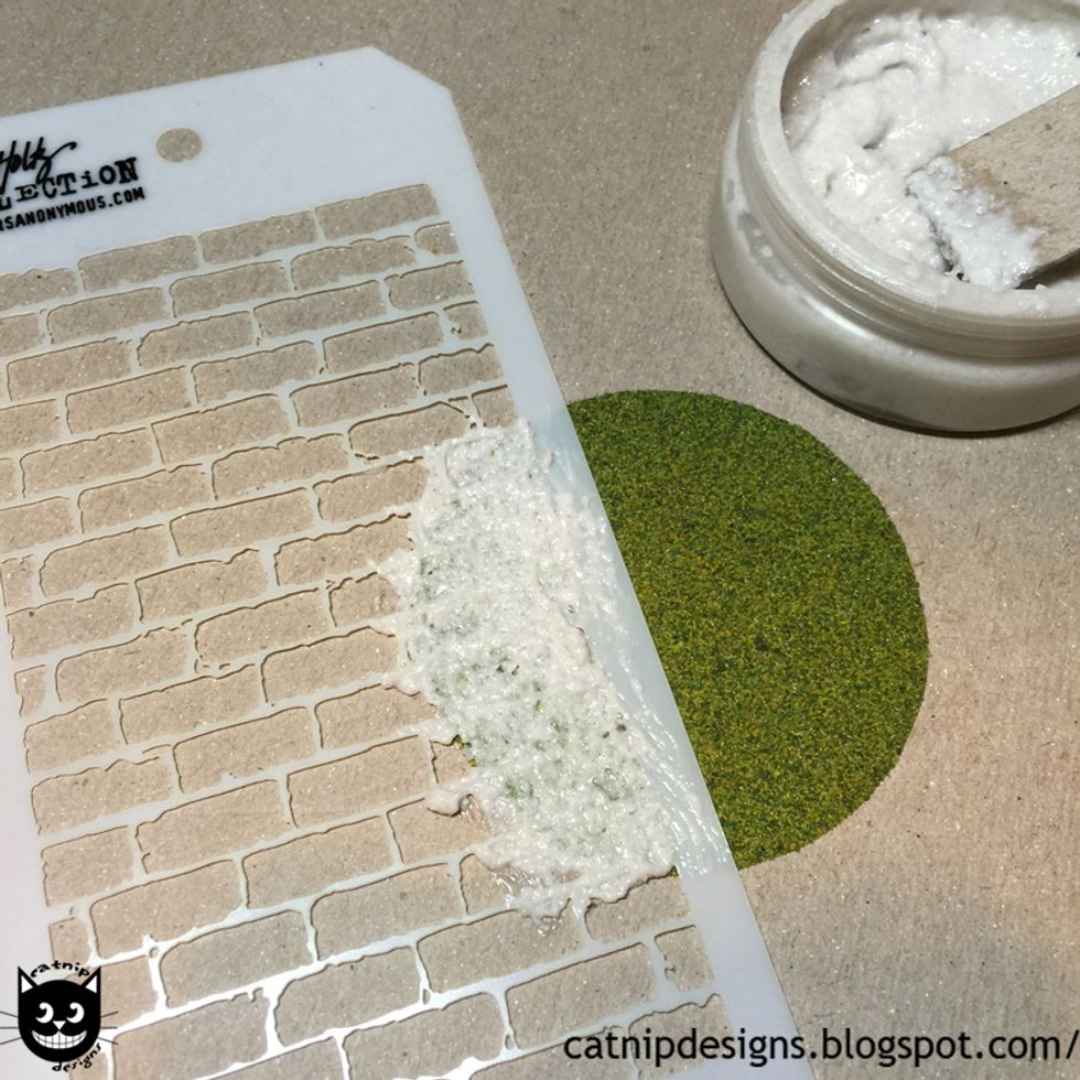 Smear it over the stencil...