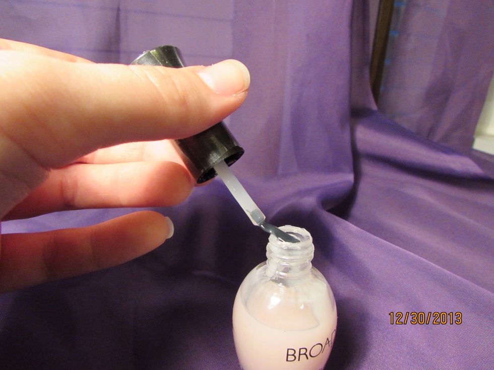 Smooth off the excess nail polish...