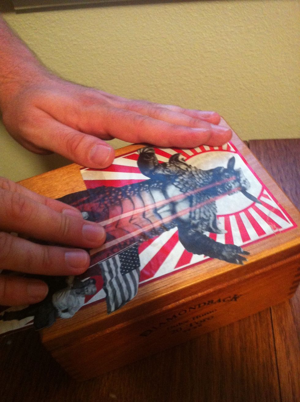 Smooth out air bubbles and wrinkles. Paper will tear very easily.