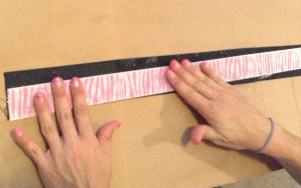 Smooth out the ribbon with the fingertips making sure not to press to firmly allowing the glue to squirt out. Let it dry.