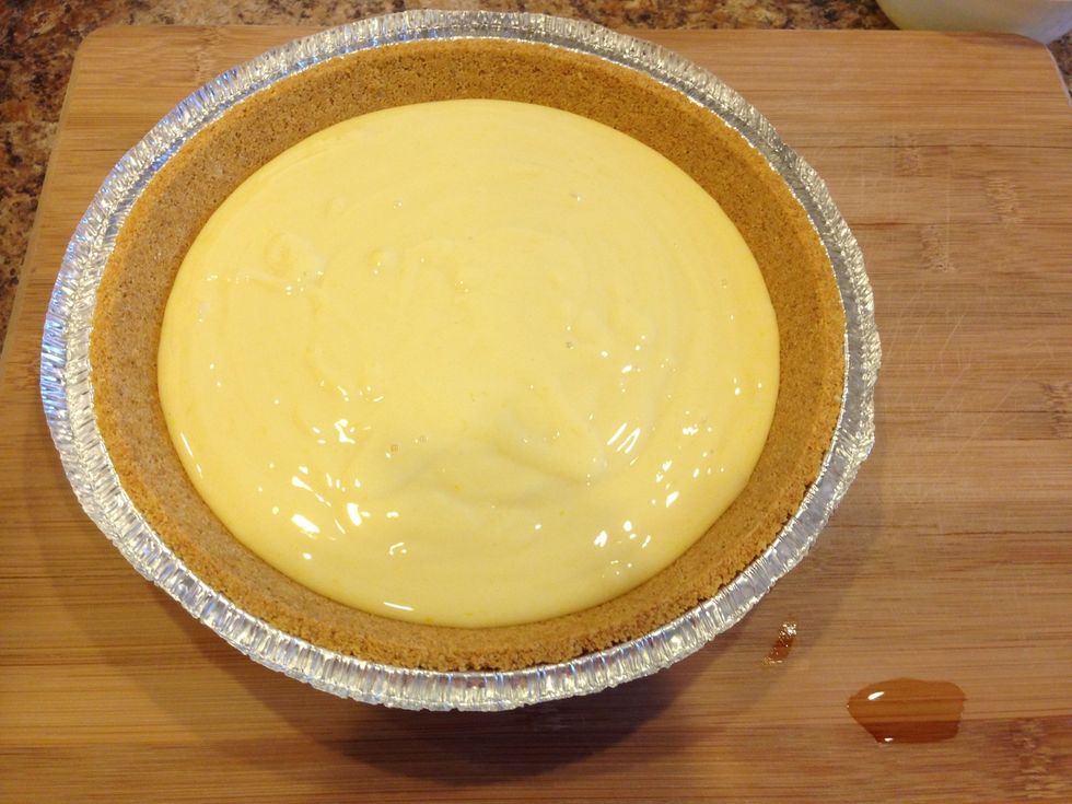 Smooth out the top and place in a preheated oven at 350 degrees. Bake for 15 minutes and let cool. This pie will not brown so make sure to pull it out after 15 minutes.