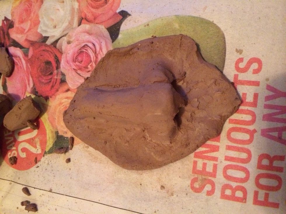 Smooth the clay out so that the clay pieces blend together. You can change the shape of the nose as needed to add different characteristics.