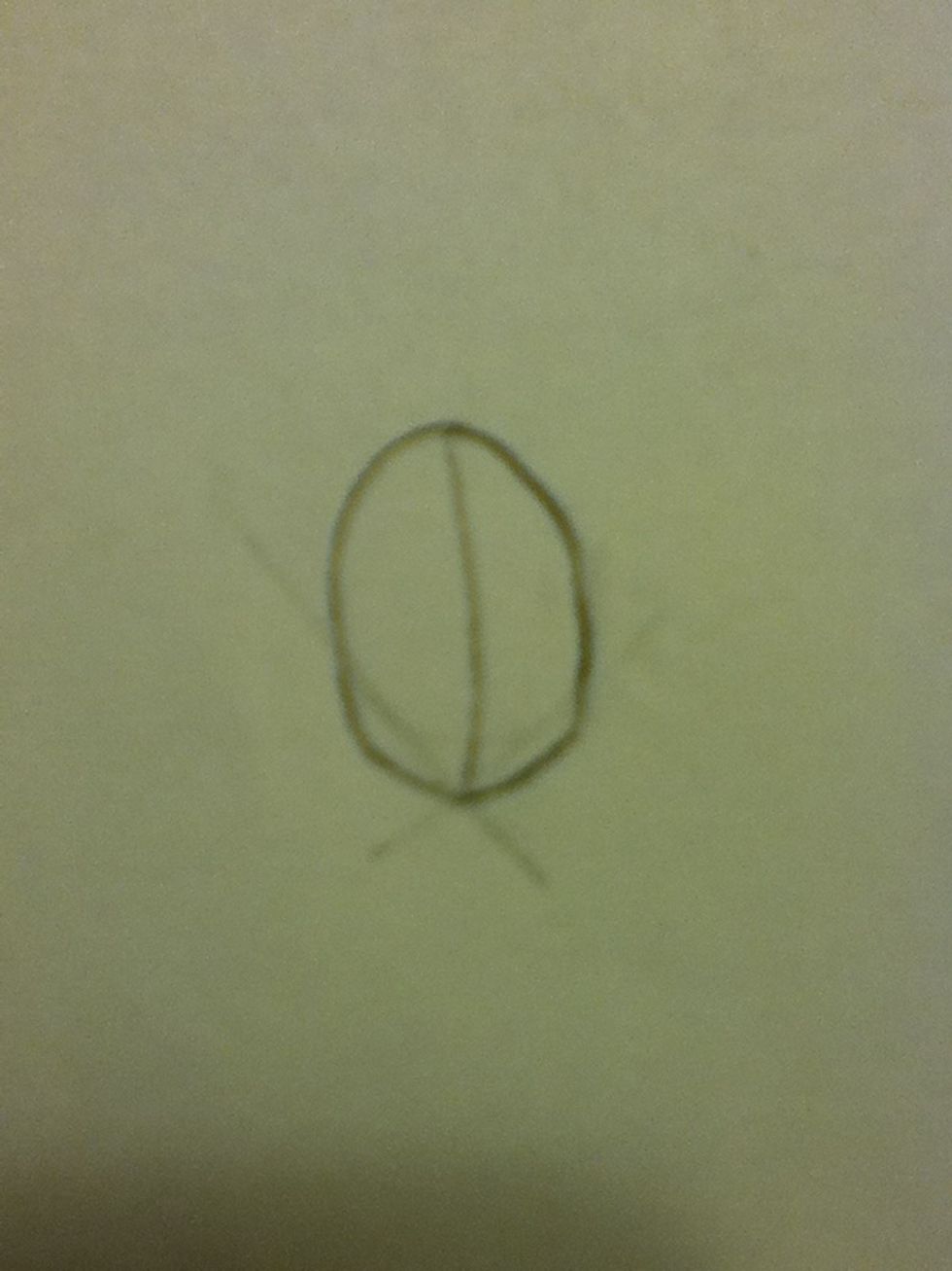 Smooth the face out by connecting the top half to the place the two lines met. You'll also want to add a line to the center, called the center line.