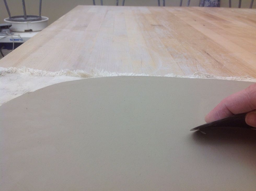 Smooth the other side with a metal rib.