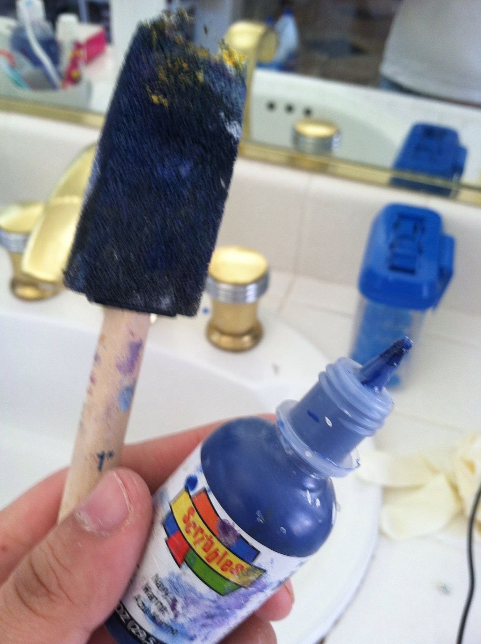 Snap out your blue fabric paint and sponge.