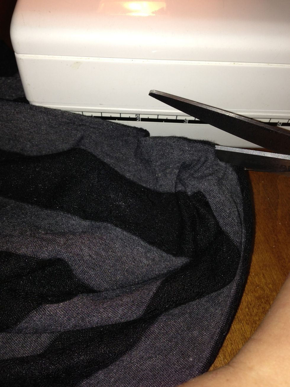 Snip a tiny hole in the center point if the fold.