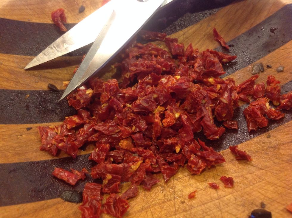 Snip/chop sun dried tomatoes...