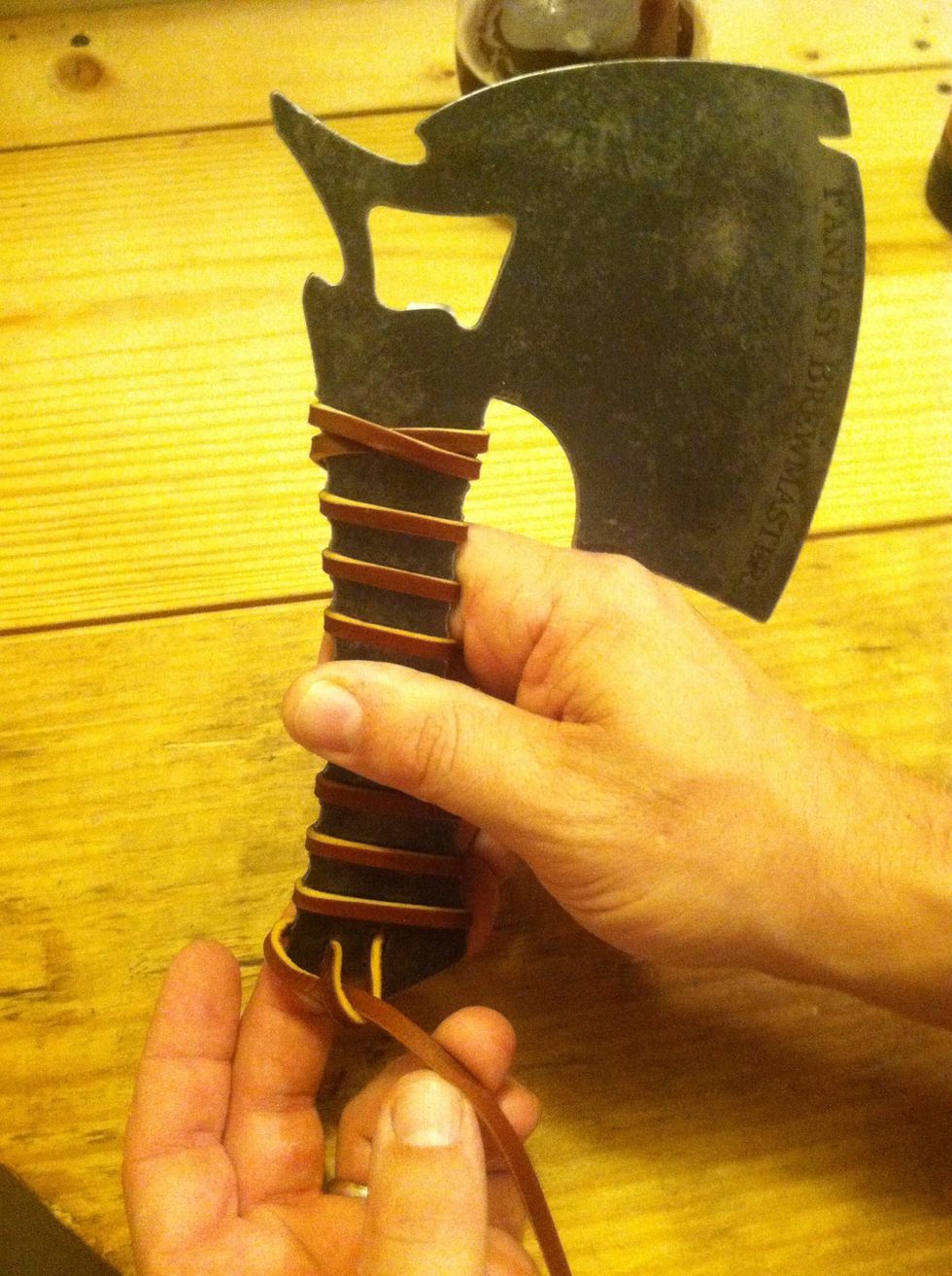 Snug up a bit more positioning our lace over the last notch opening on the left before we tighten up.