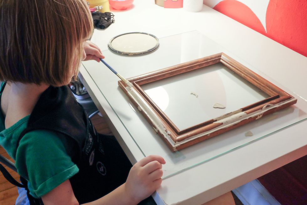 So easy, a five-year-old could do it! Literally. (My daughter loved doing this project! I did the large frame, and she worked along with me, on the small one.)