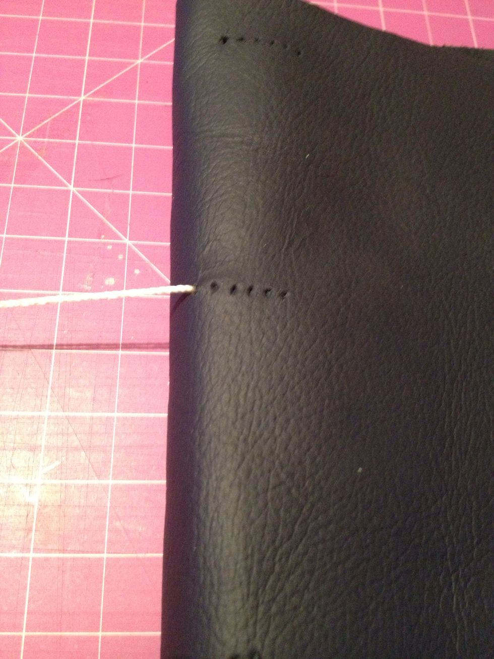 So going the centre hole to the top hole on the outside this makes the nice stitched on the exterior.