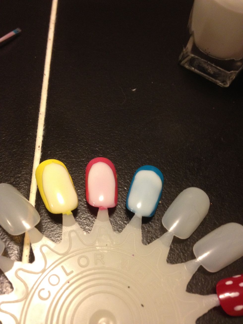 So here is my second coat, let's wait for the design to dry so we can start making your penguins face :)