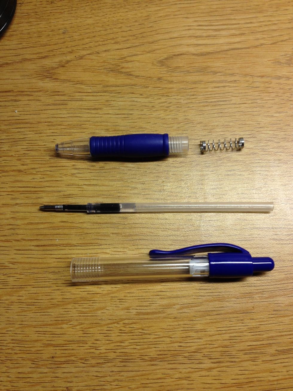 So here is the solution. If you don't have a spring on hand (I'm assuming most of us don't), take apart a used pen and grab the spring in the barrel.