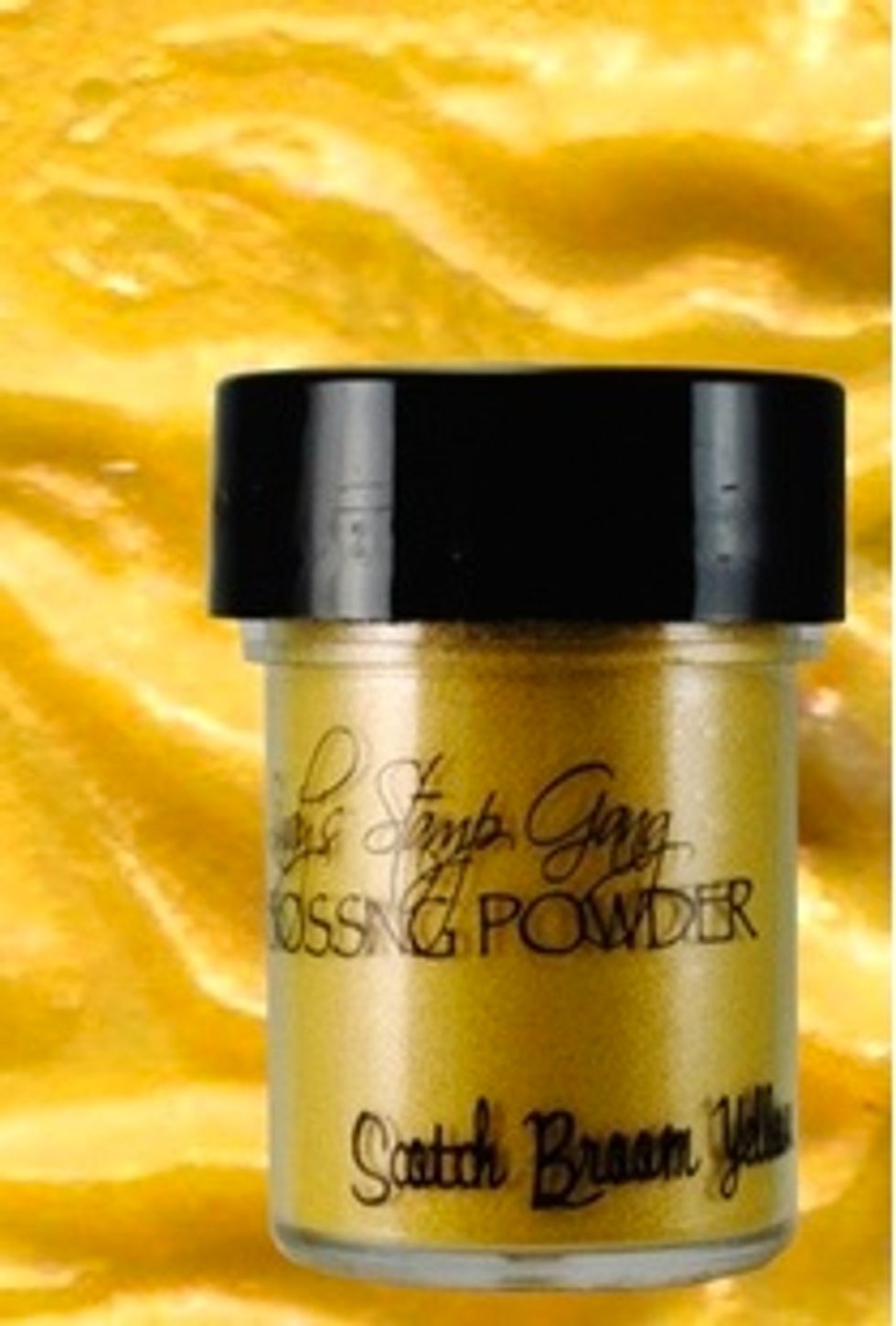 So I forgot to take a picture of this step, but add your powder over your piece, then use your finger to remove some in random areas. Use your heat gun to emboss!